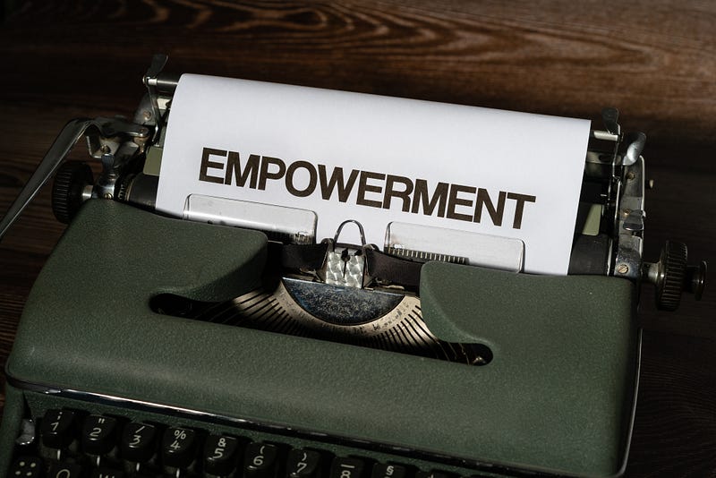a paper with ‘empowerment’ on it