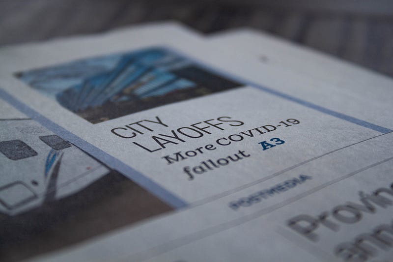 newspaper titled layoff